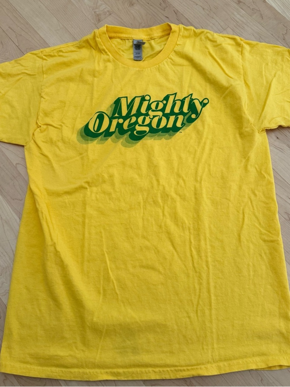 Oregon Ducks Yellow Tee with Green "Mighty Oregon" Graphic